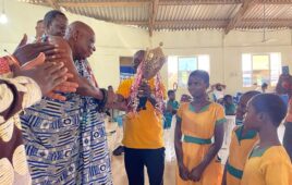 Torgbe Addae Kwasi Djani XIII presenting trophy
